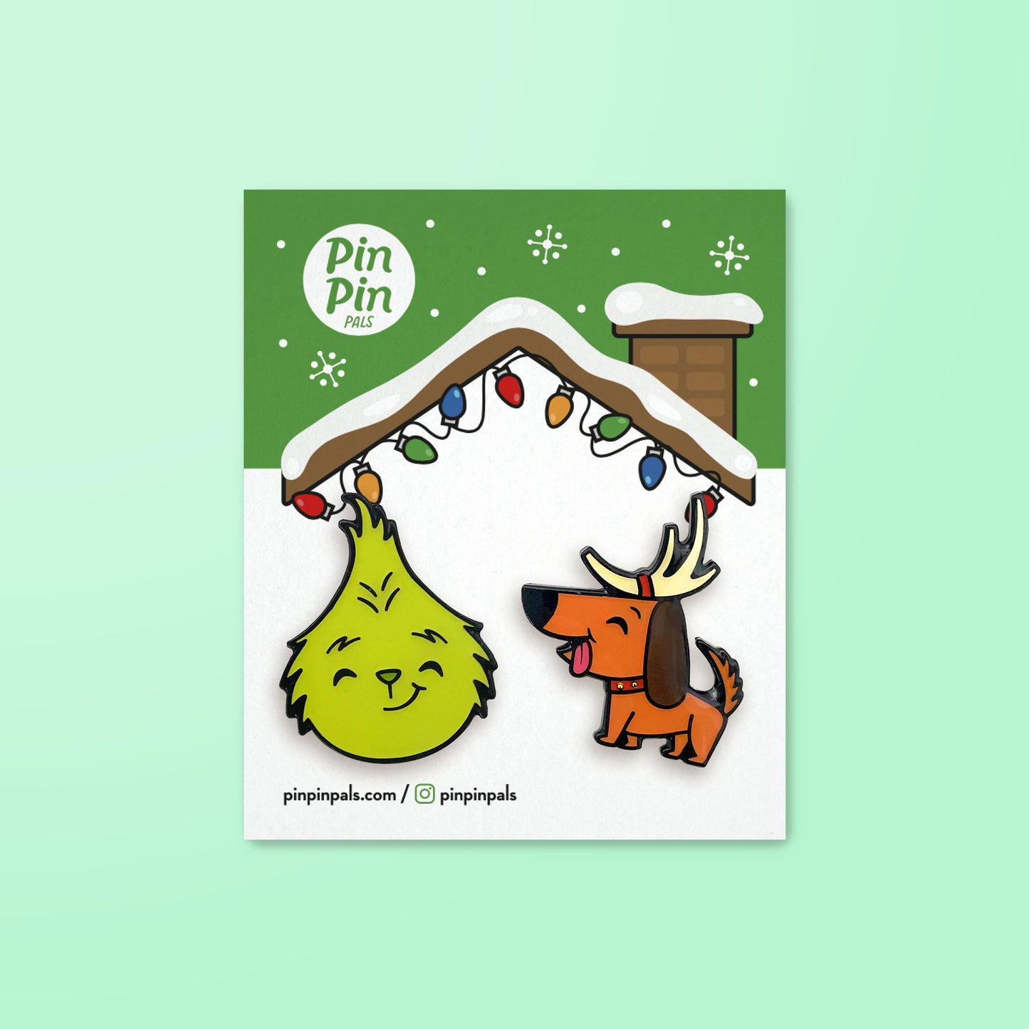 The Grinch and Max enamel pin set on backer card