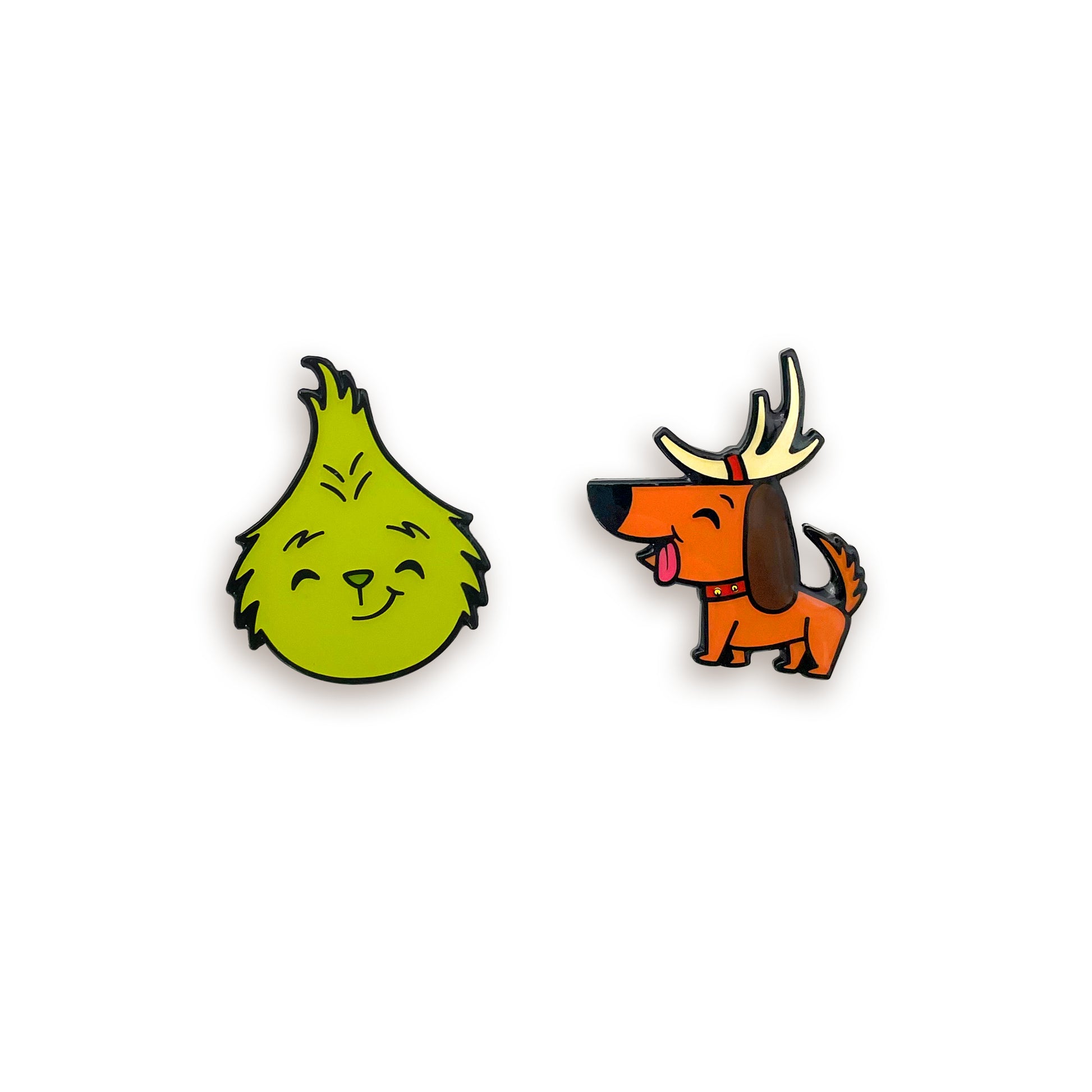 The Grinch and Max enamel pins on white background