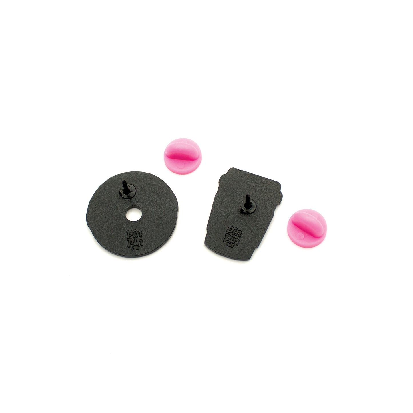 Backs of Donut and Coffee enamel pins with pink rubber backings