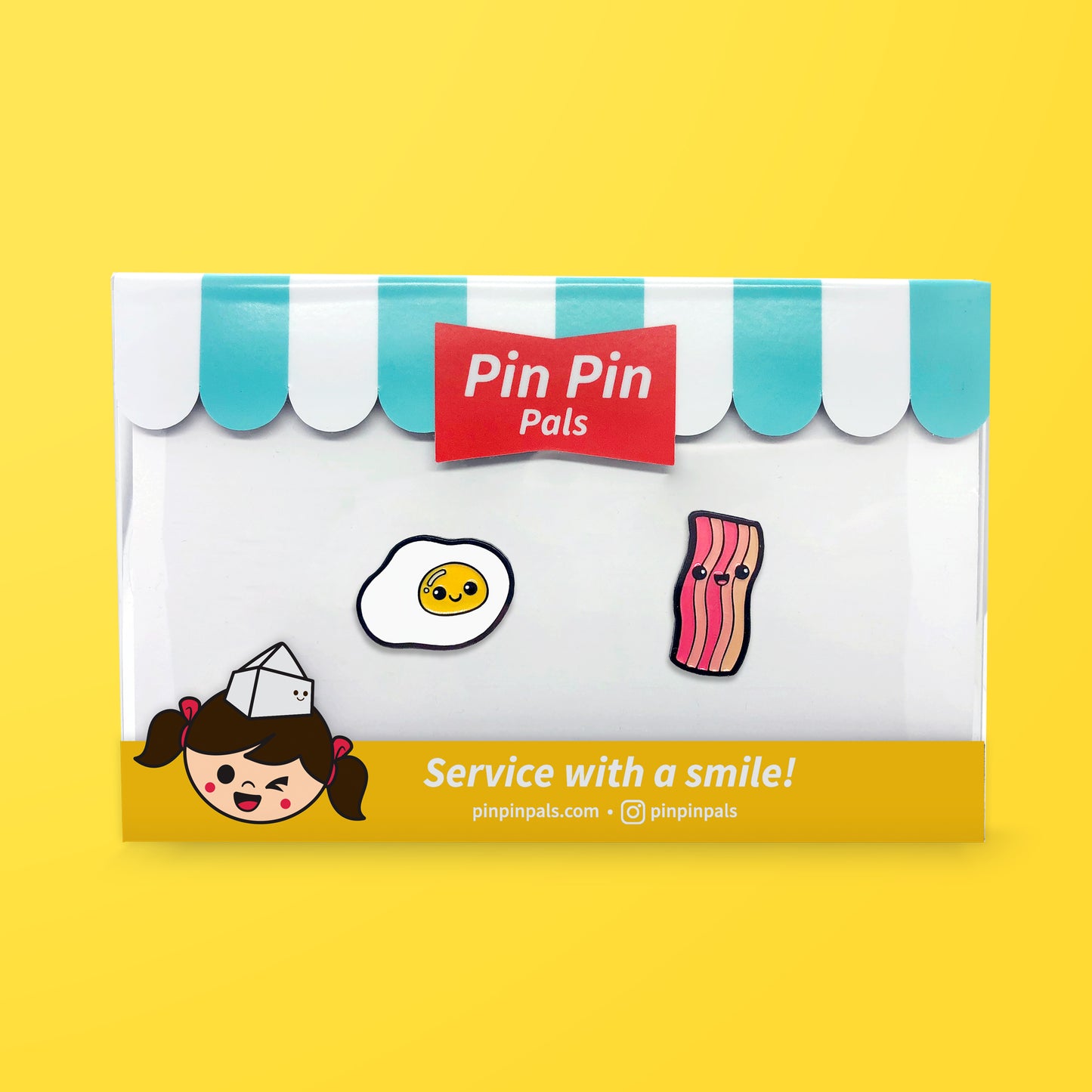 Pin Pin Pals Egg and Bacon enamel pin set in packaging box on yellow background
