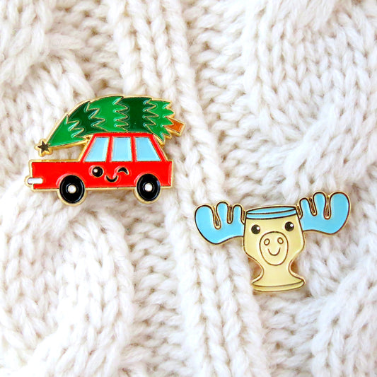 Christmas Vacation Car and Moose Mug enamel pin set on cream knitted sweater