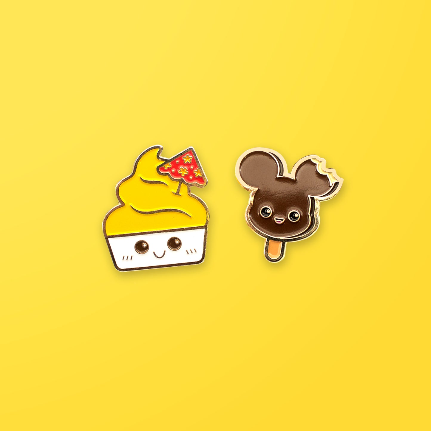 Disney Dole Whip and Mickey Ice Cream enamel pin set on yellow background