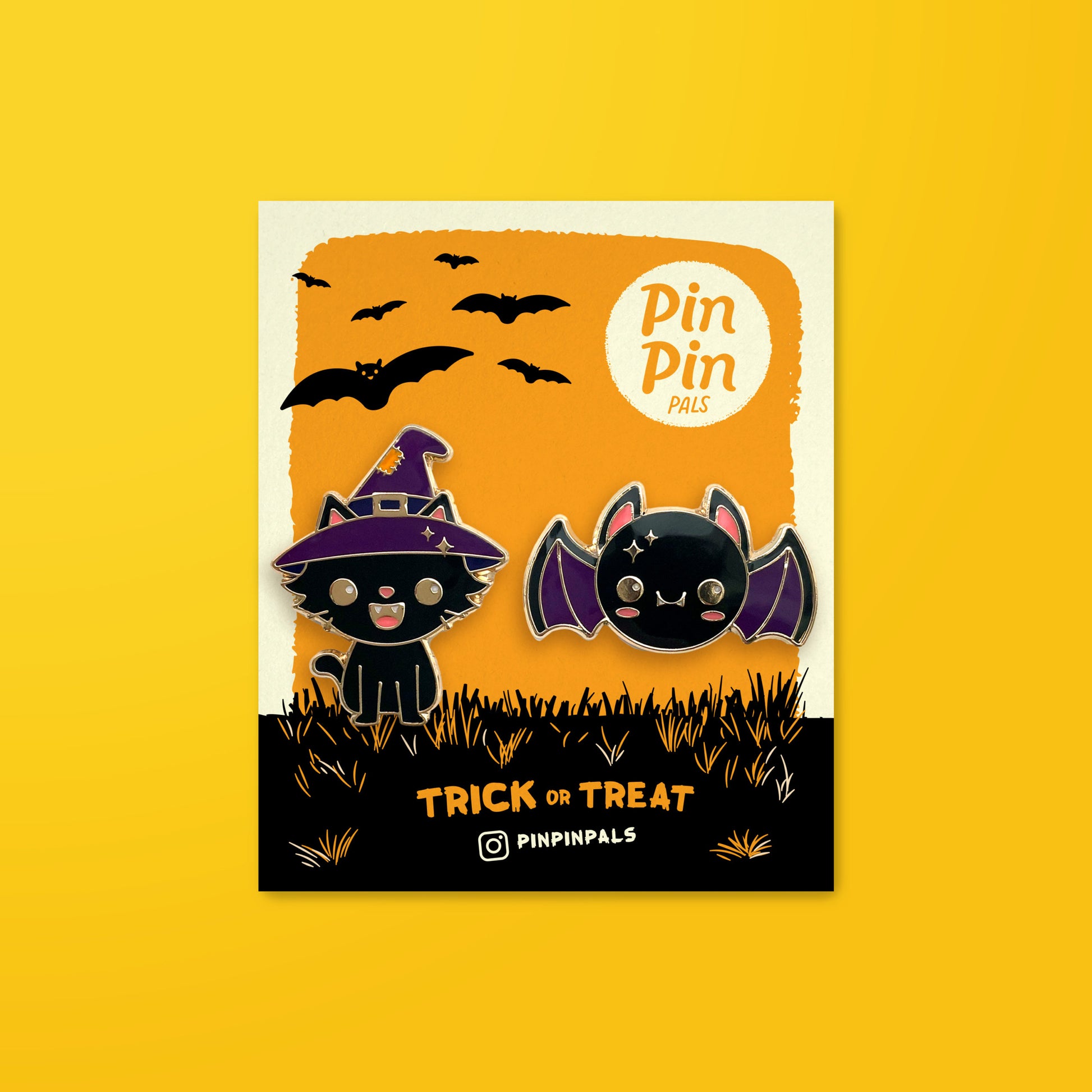 Halloween Cat and Bat enamel pin set on backer card