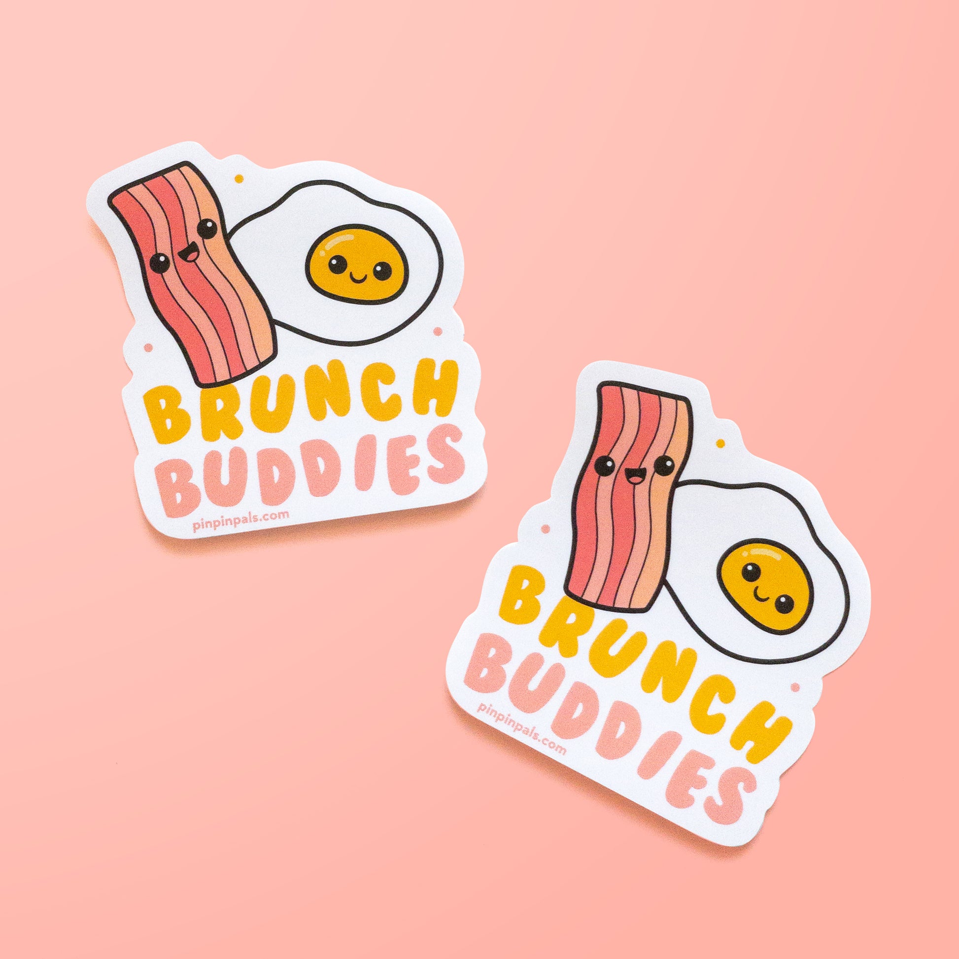 Two Brunch Buddies - egg and bacon vinyl stickers on pink background