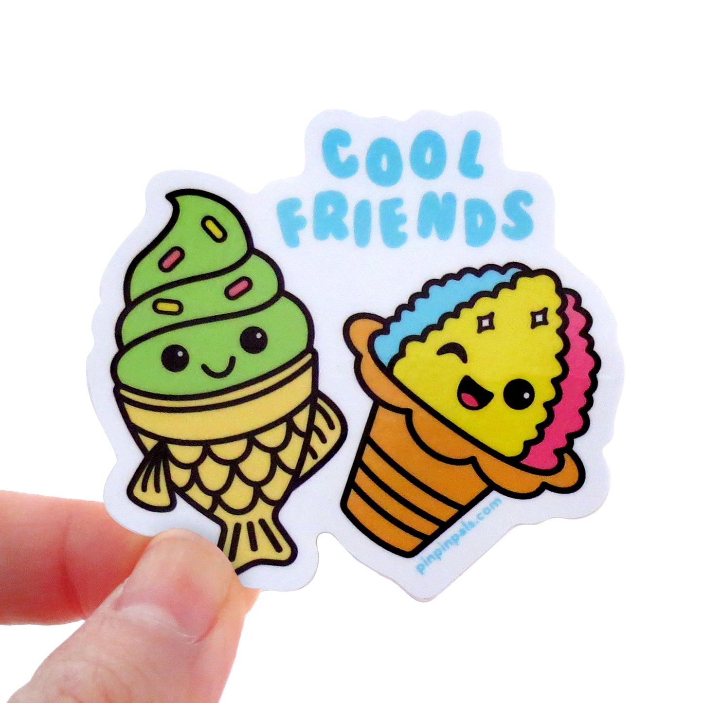 Hand holding a Cool Friends - Taiyaki and Shaved Ice vinyl sticker