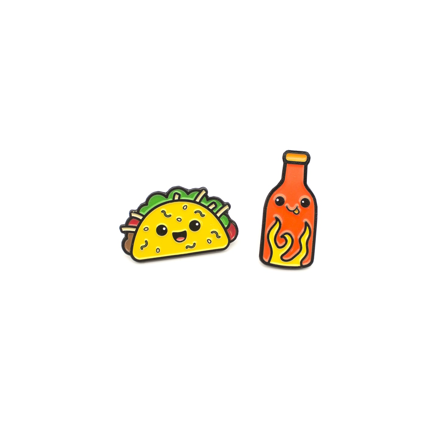 Taco and Hot Sauce enamel pins on white background